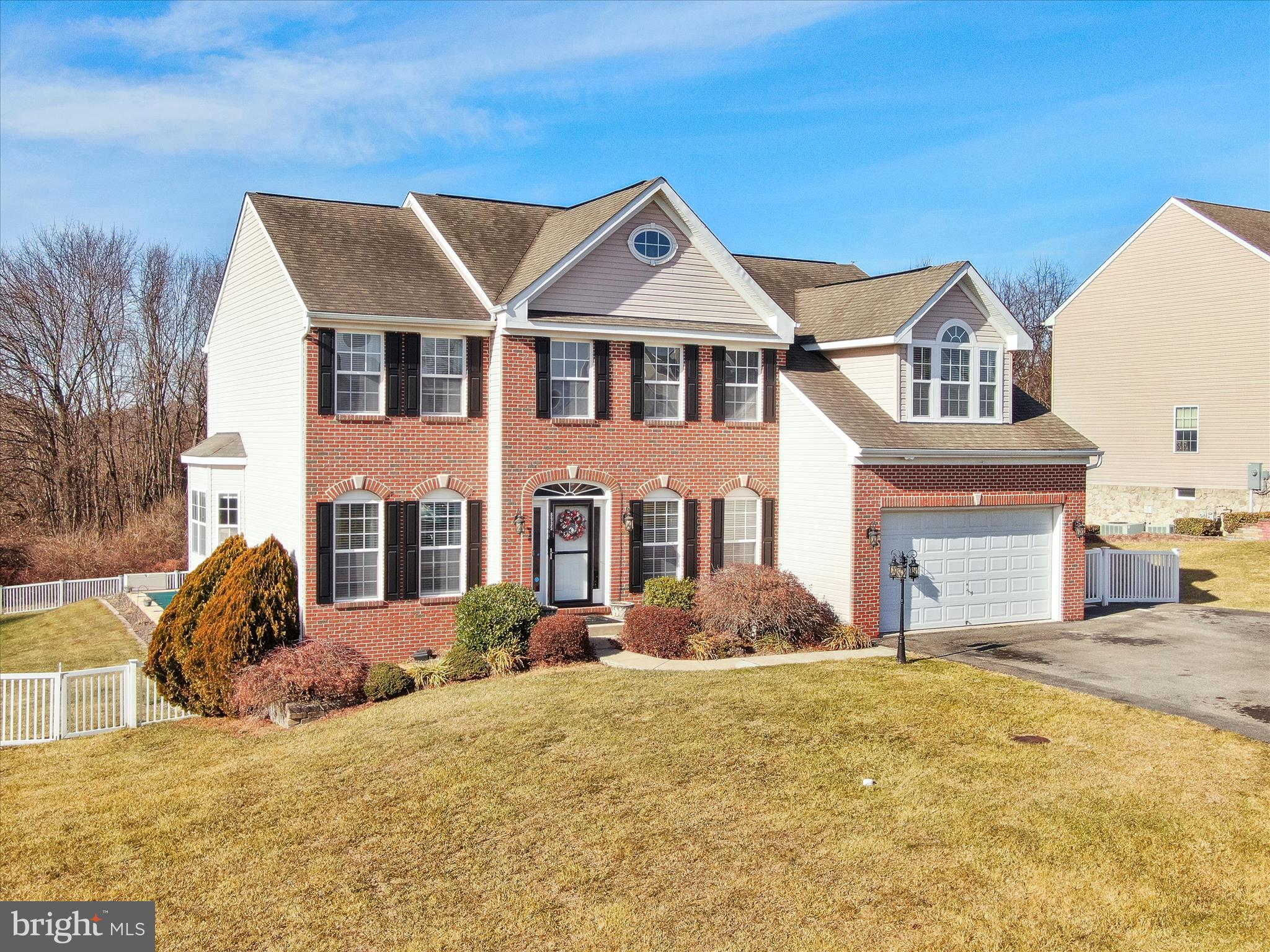 8935 Harper Drive Waynesboro, PA 17268 - Photo 2 of 46 a front view of a house with a yard