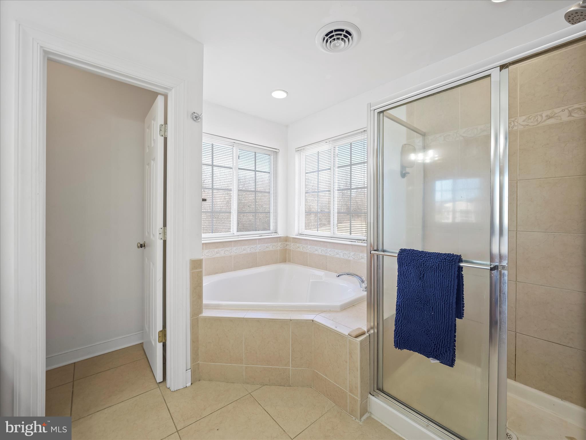 8935 Harper Drive Waynesboro, PA 17268 - Photo 27 of 46 a spacious bathroom with a tub and shower