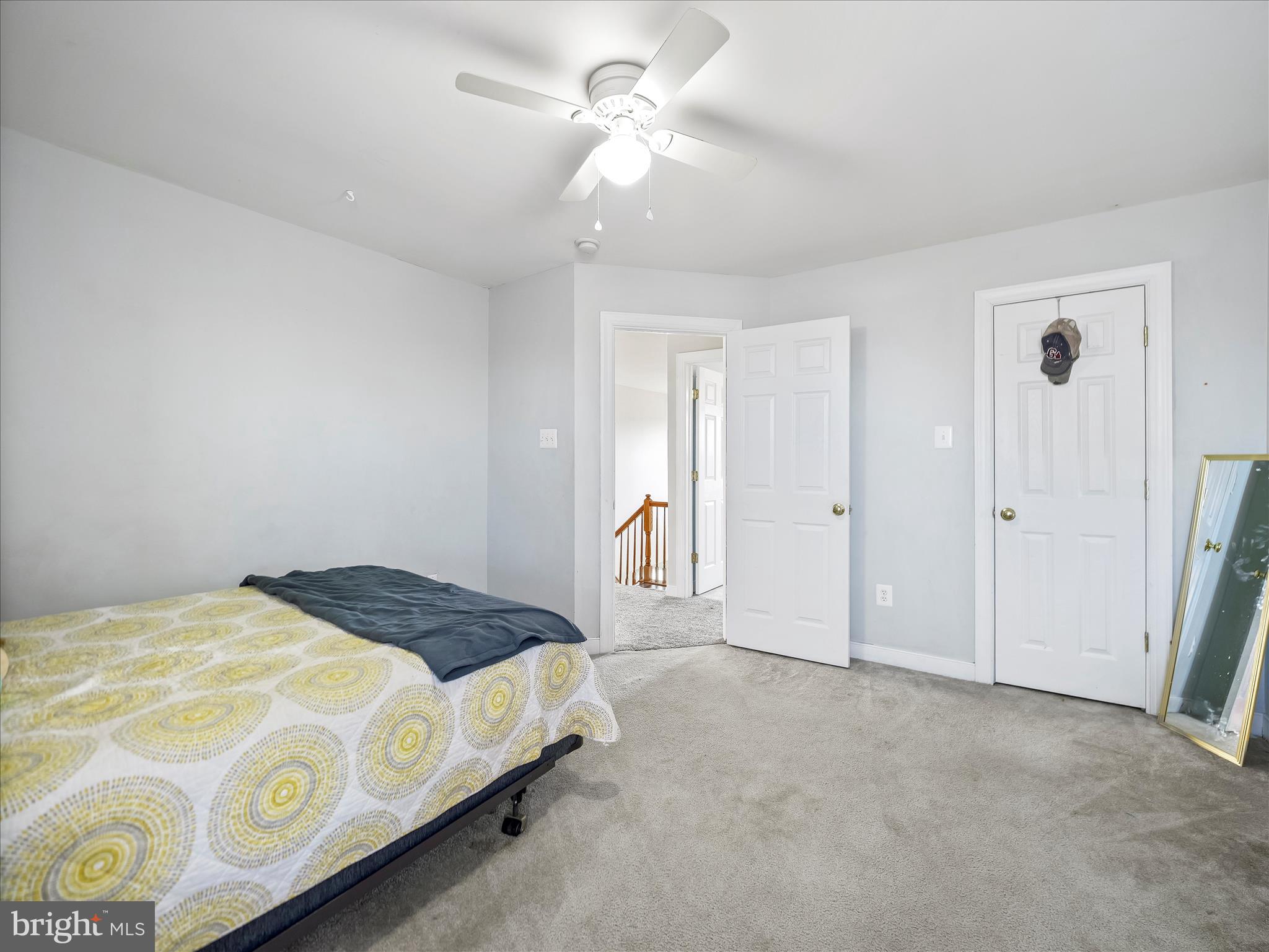 8935 Harper Drive Waynesboro, PA 17268 - Photo 28 of 46 a bedroom with a bed and a ceiling fan