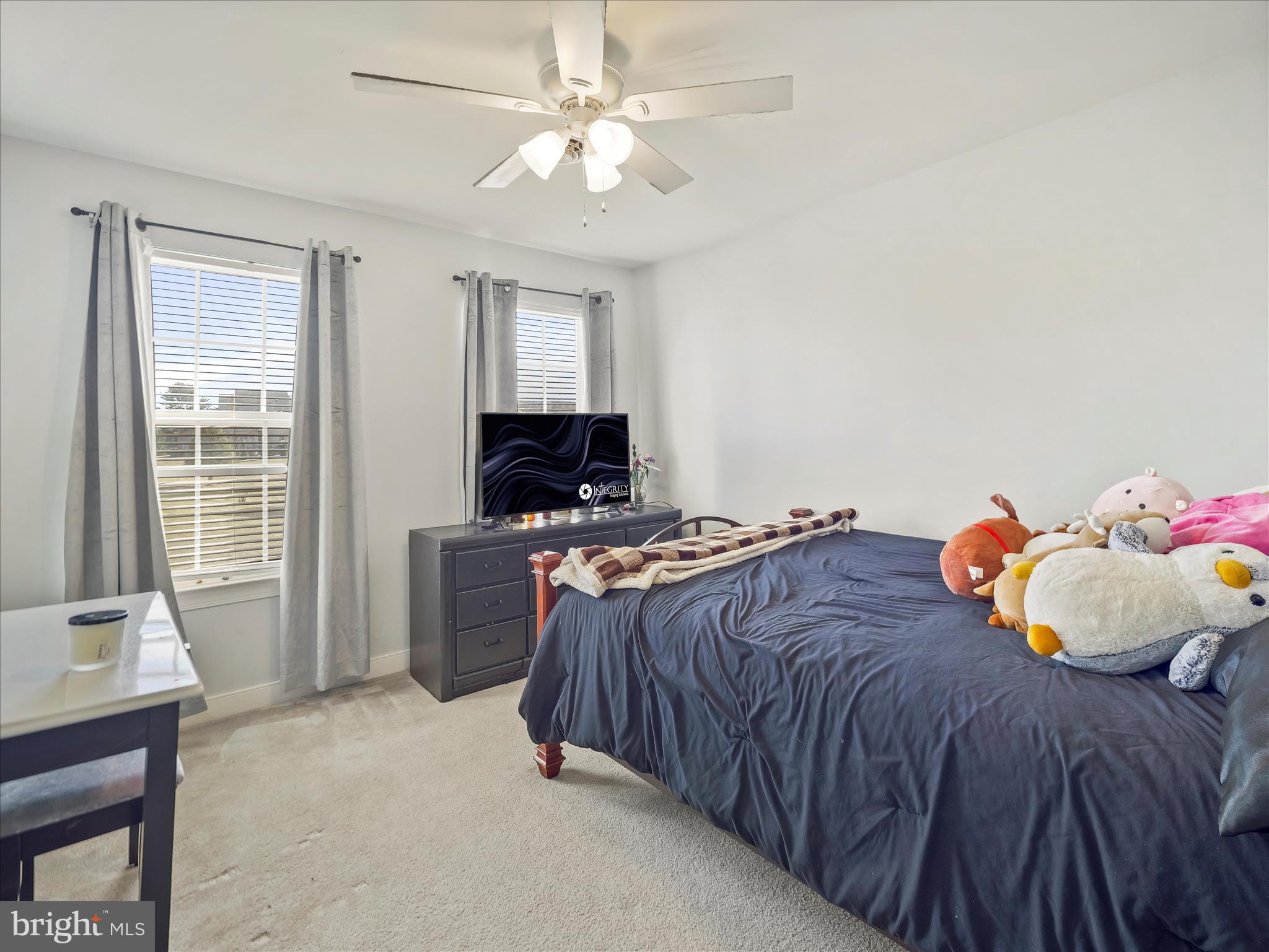 8935 Harper Drive Waynesboro, PA 17268 - Photo 29 of 46 a bedroom with a bed and a flat screen tv