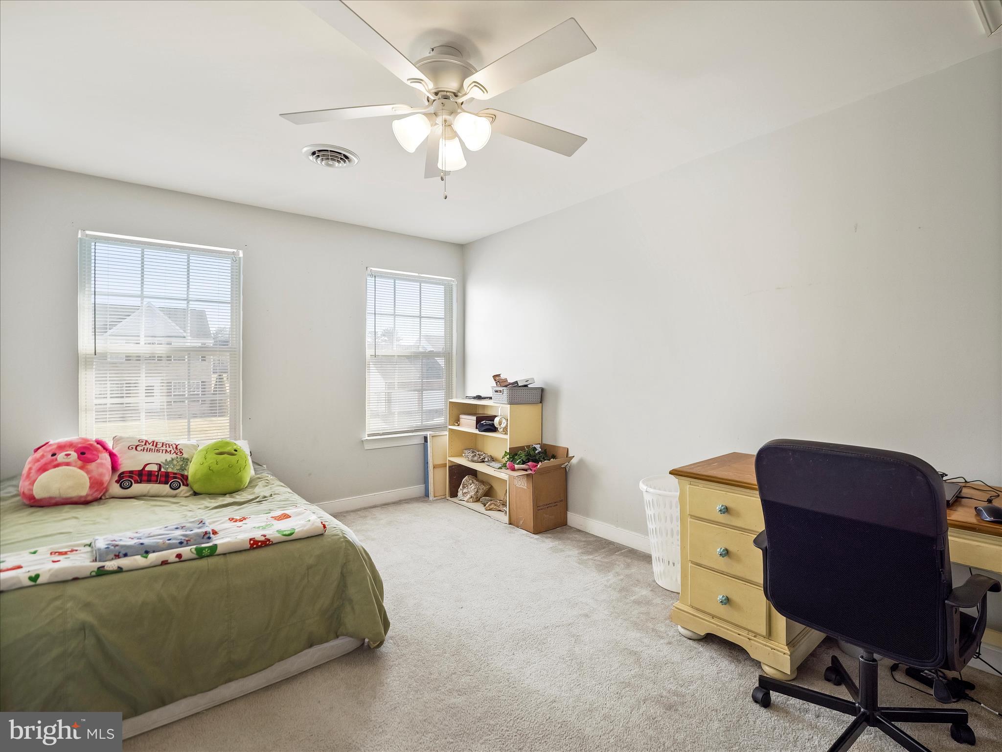 8935 Harper Drive Waynesboro, PA 17268 - Photo 30 of 46 a bedroom with a bed and a chandelier