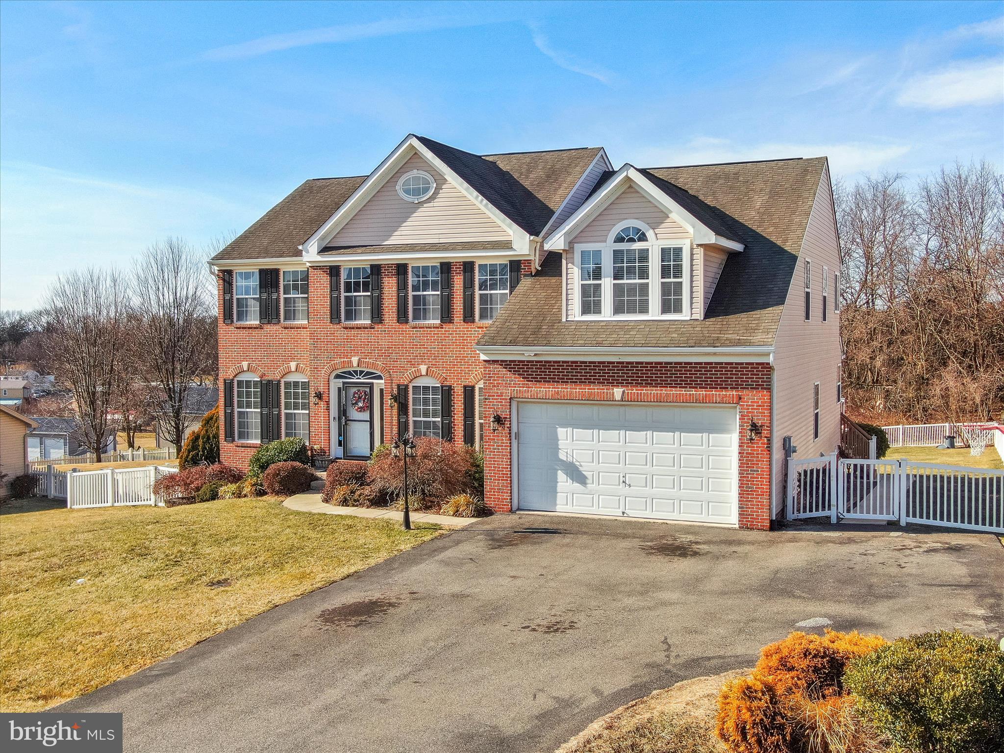 8935 Harper Drive Waynesboro, PA 17268 - Photo 3 of 46 a front view of a house with a yard