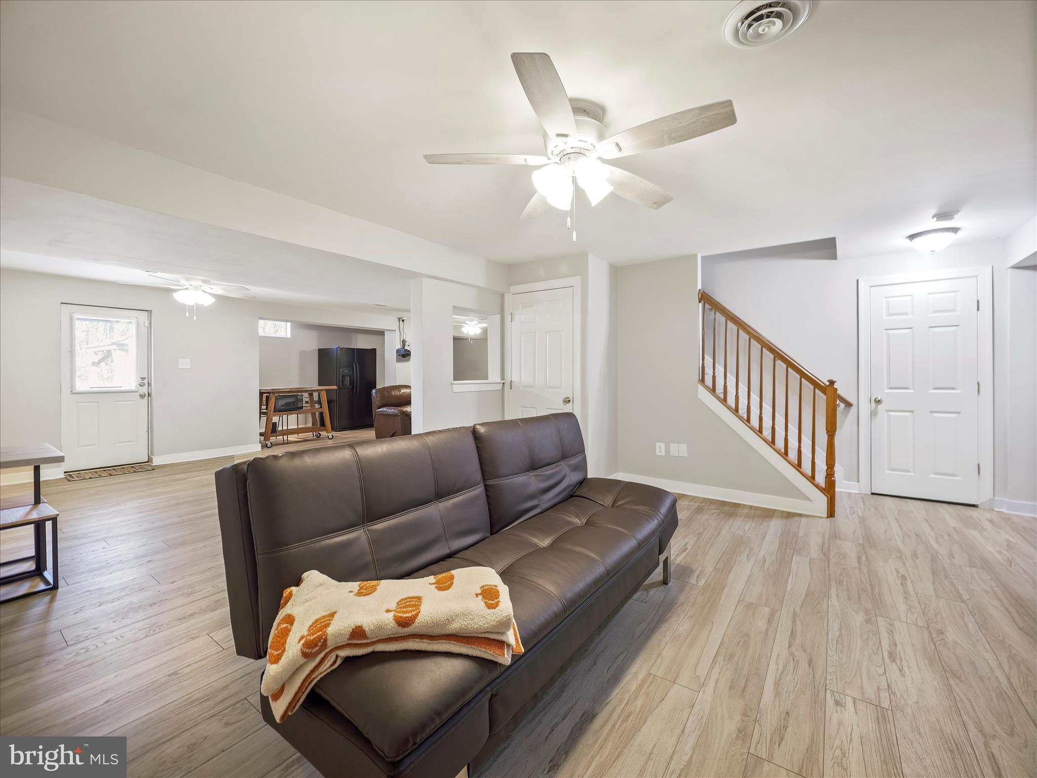 8935 Harper Drive Waynesboro, PA 17268 - Photo 33 of 46 a living room with furniture and wooden floor