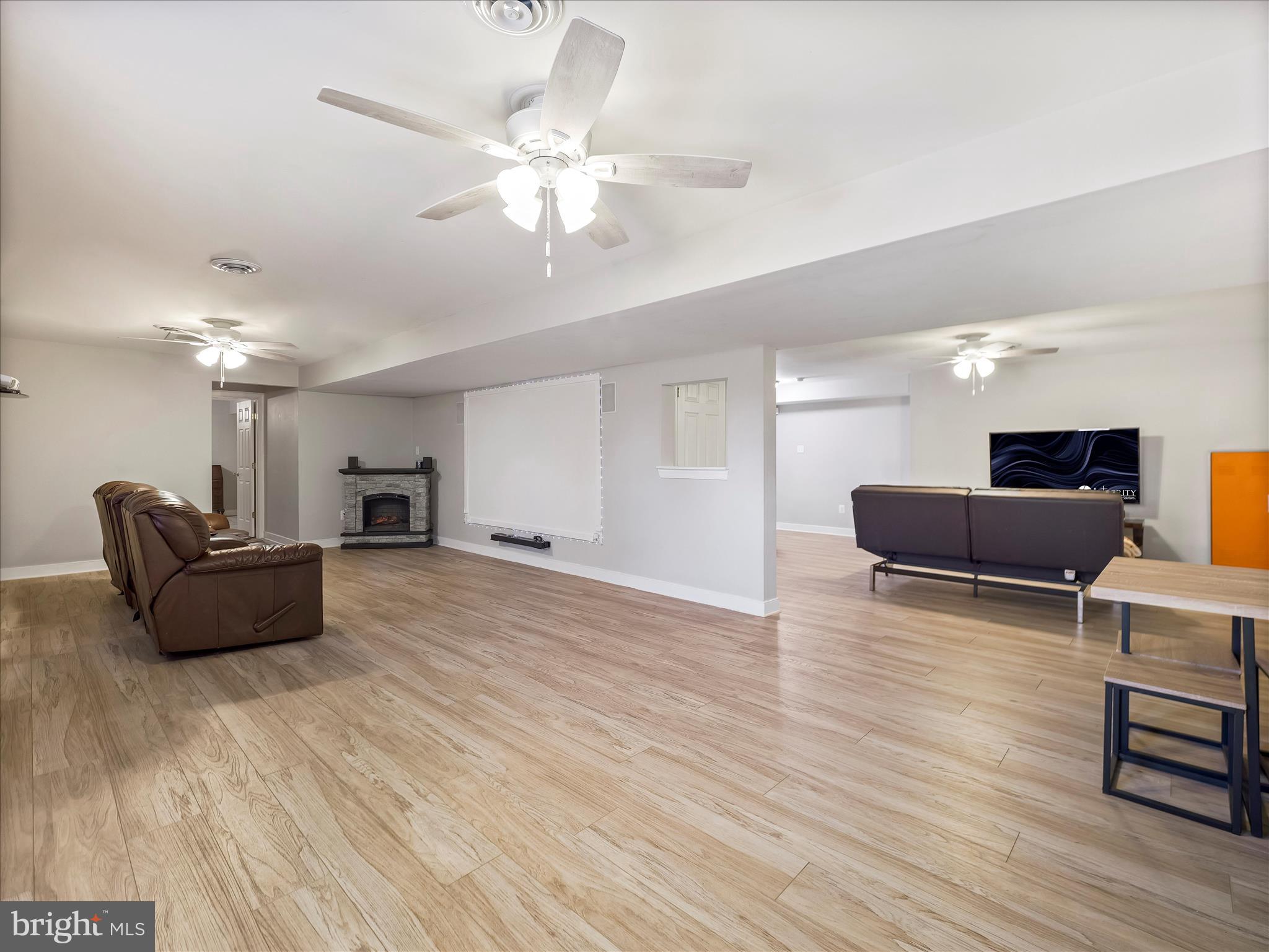 8935 Harper Drive Waynesboro, PA 17268 - Photo 34 of 46 a living room with furniture and a chandelier