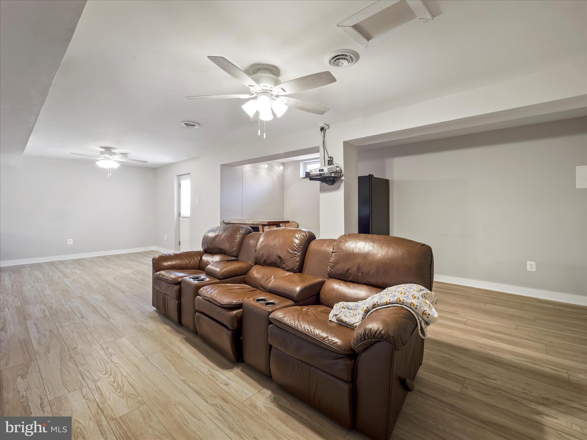 8935 Harper Drive Waynesboro, PA 17268 - Photo 35 of 46 a living room with furniture and a wooden floor