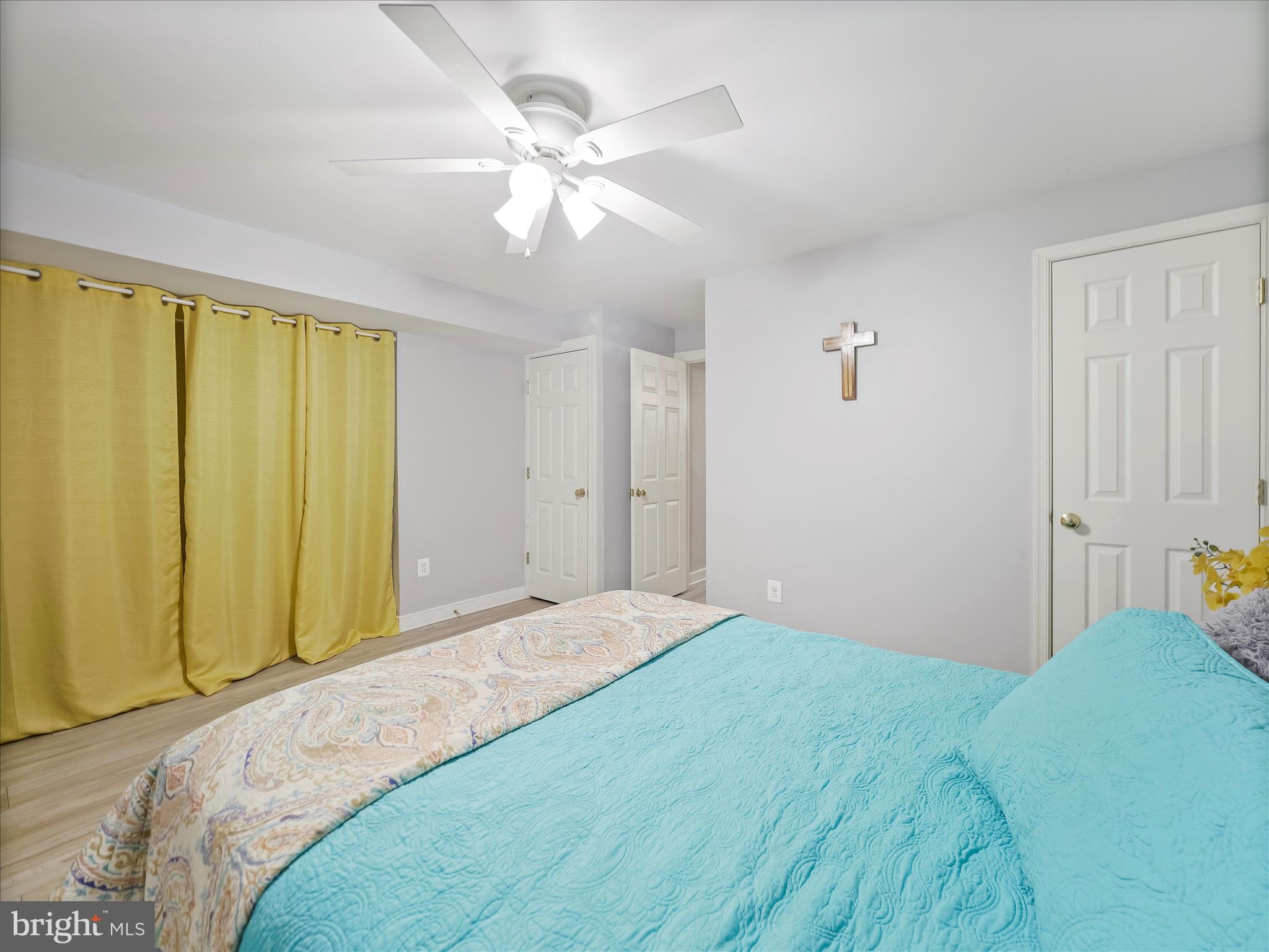 8935 Harper Drive Waynesboro, PA 17268 - Photo 37 of 46 a bedroom with a bed and a chandelier