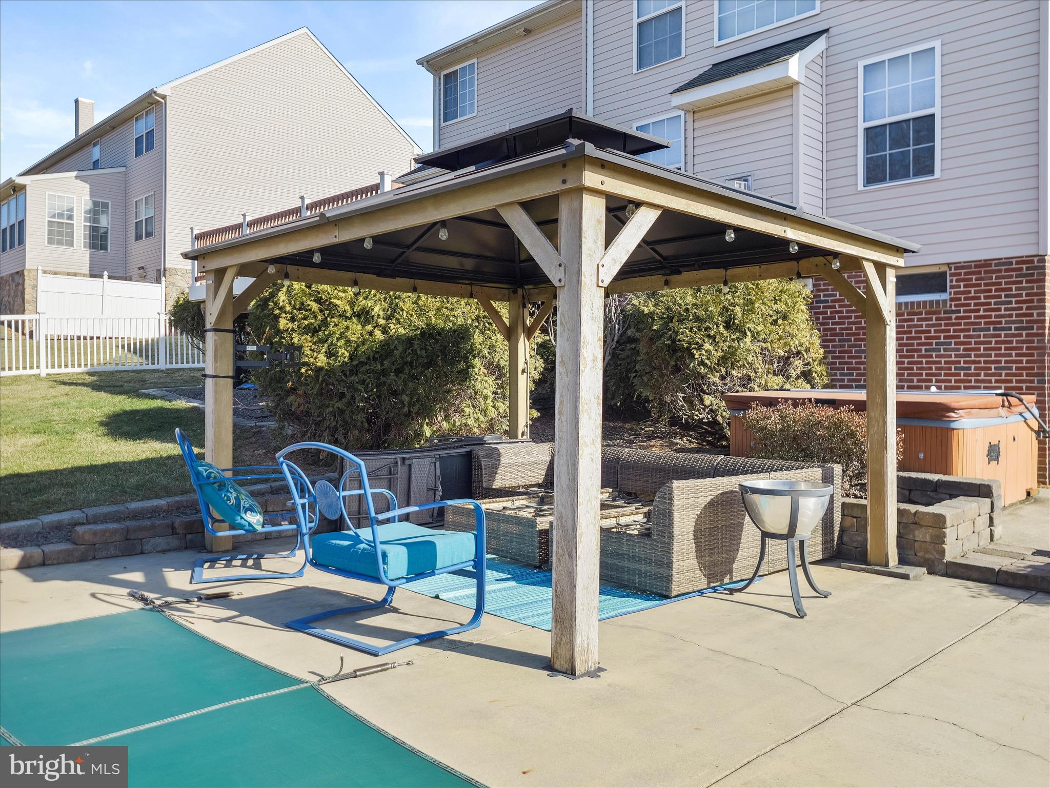 8935 Harper Drive Waynesboro, PA 17268 - Photo 45 of 46 a front view of a house with swimming pool patio and glass door