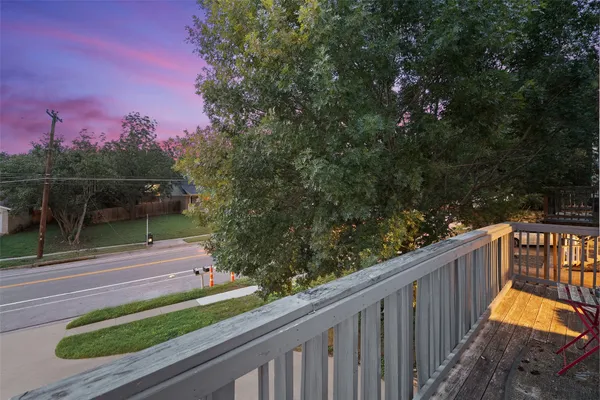 a balcony with an outdoor space
