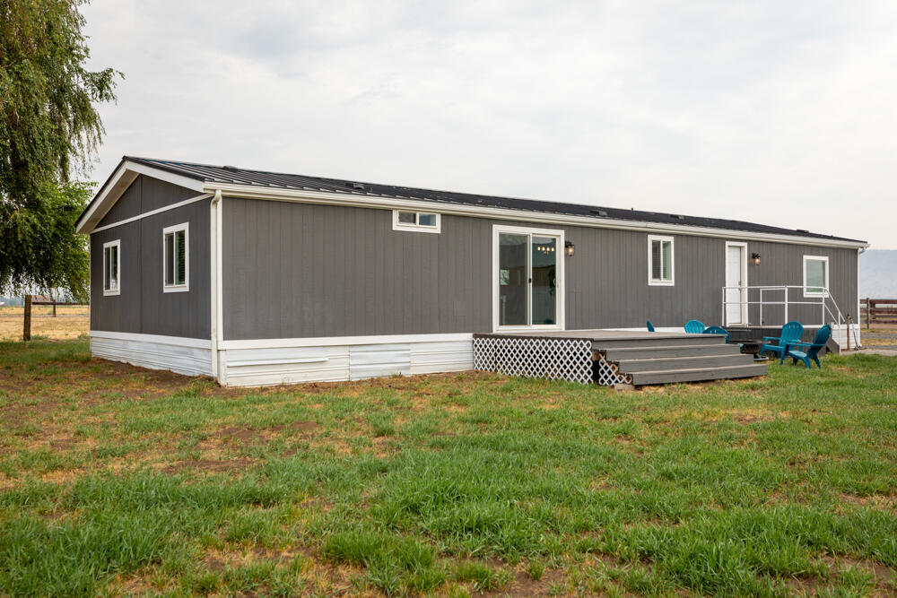 8757 Reeder Road Klamath Falls, OR 97603 - Photo 14 of 34 a view of a house with a yard