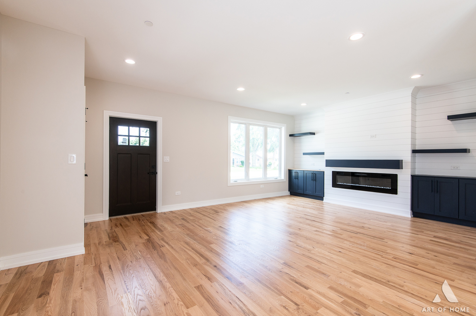 7957 West 73rd Place Bridgeview, IL 60455 - Photo 7 of 40 a view of empty room with wooden floor and kitchen