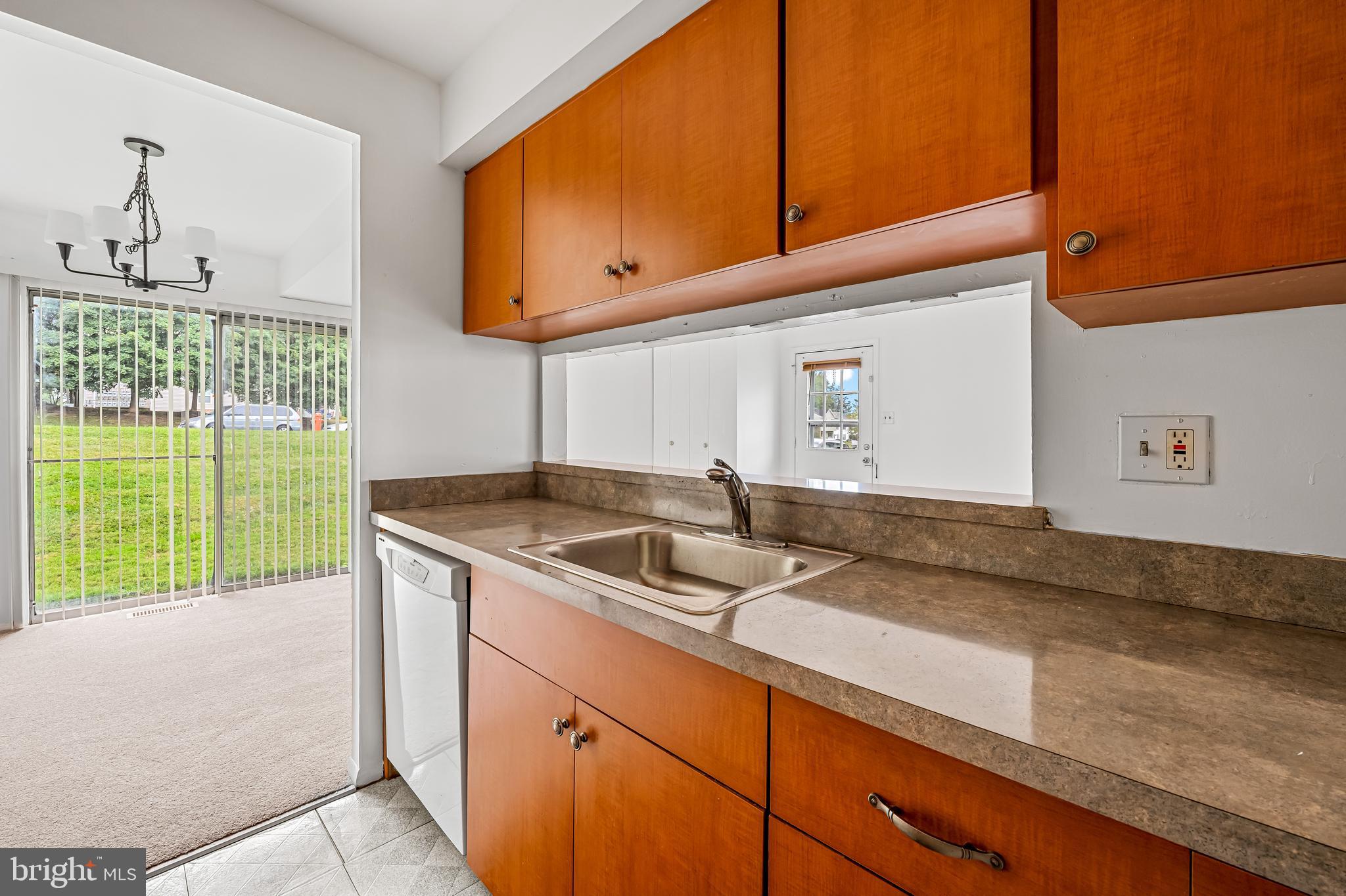 26 Mission Wood Way, Unit A Reisterstown, MD 21136 - Photo 16 of 29 a kitchen with a sink and a window