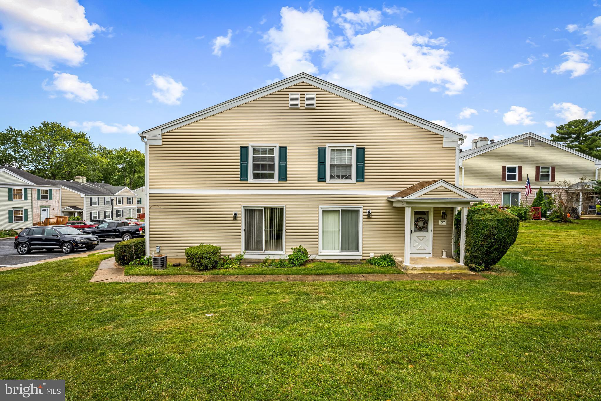 26 Mission Wood Way, Unit A Reisterstown, MD 21136 - Photo 29 of 29 a front view of a house with a yard