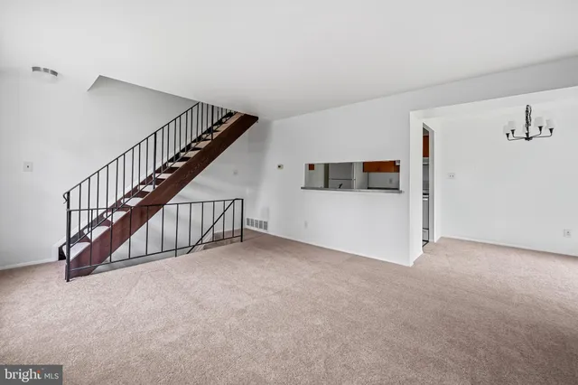 a view of a livingroom with a staircase
