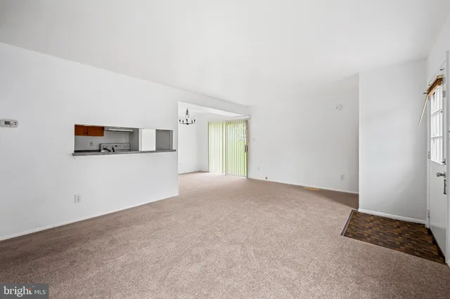 a view of a room with a windows