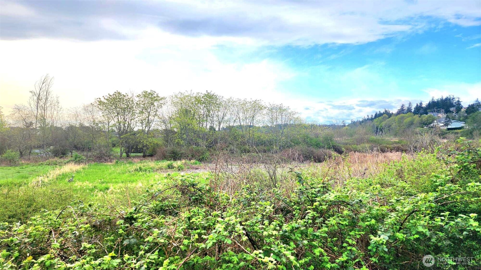 485 Southwest Bayshore Drive, Unit C301 Oak Harbor, WA 98277 - Photo 18 of 40 a view of a lake with a city