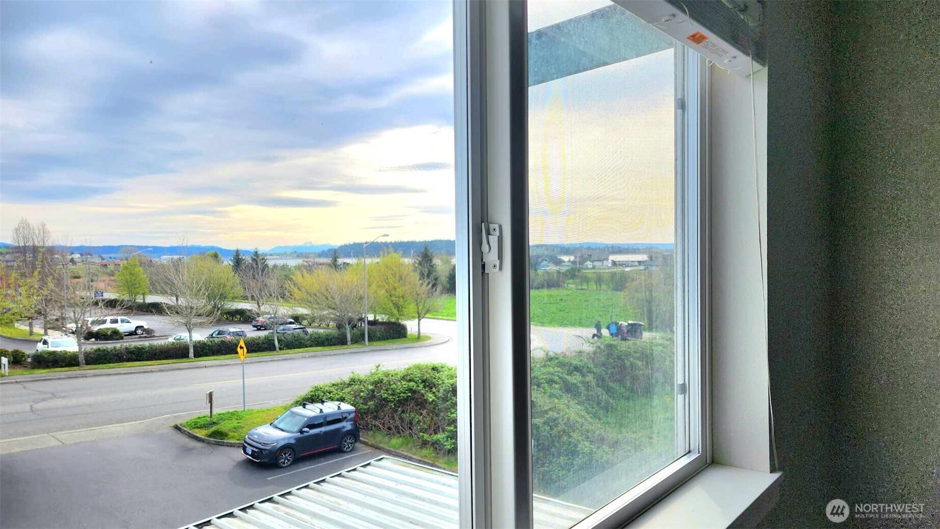 485 Southwest Bayshore Drive, Unit C301 Oak Harbor, WA 98277 - Photo 28 of 40 a view of a city from a balcony