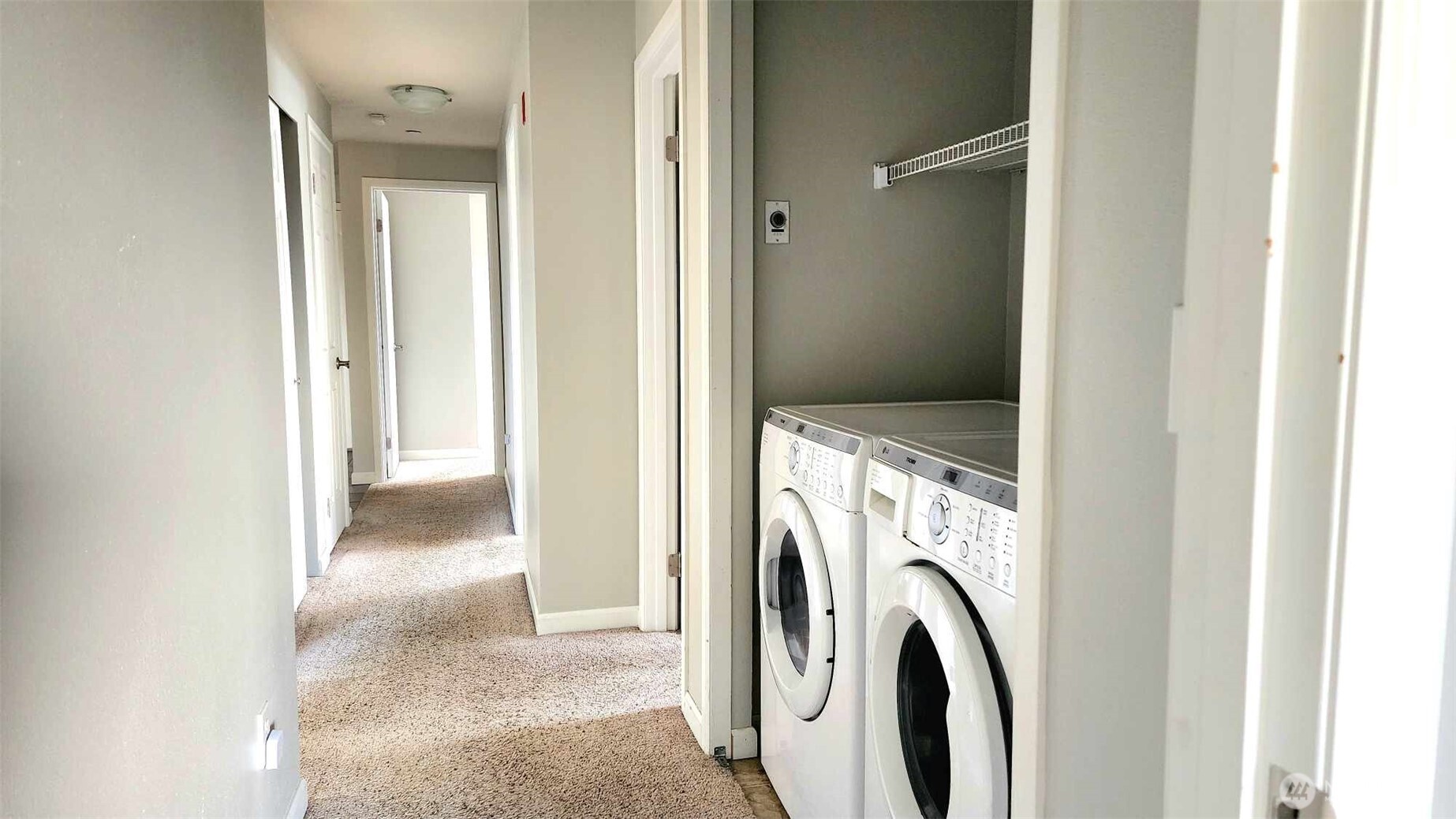 485 Southwest Bayshore Drive, Unit C301 Oak Harbor, WA 98277 - Photo 32 of 40 a view of a bathroom with washing machine