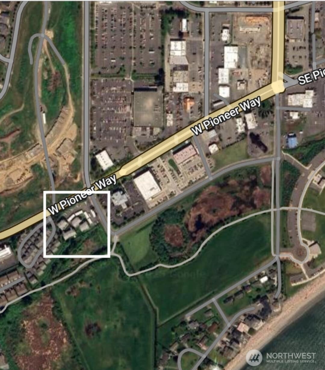 485 Southwest Bayshore Drive, Unit C301 Oak Harbor, WA 98277 - Photo 40 of 40 an outdoor space with wooden benches