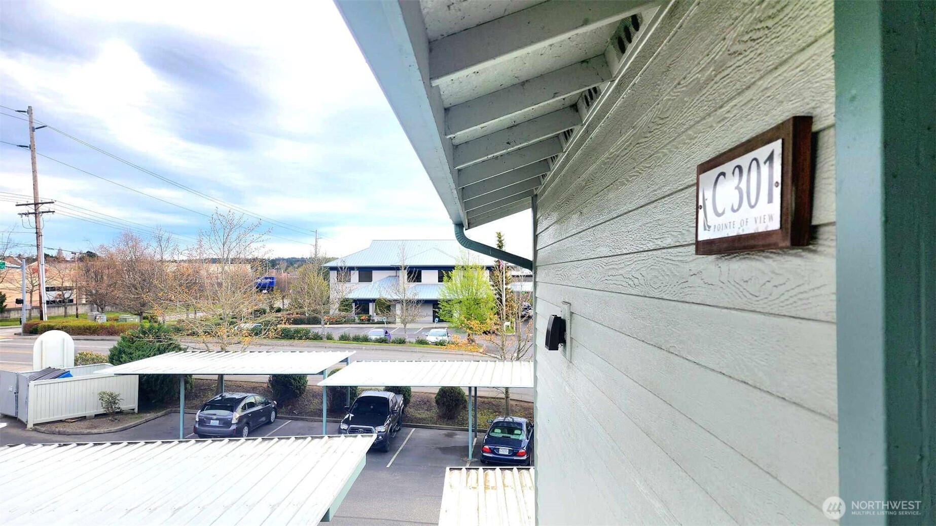 485 Southwest Bayshore Drive, Unit C301 Oak Harbor, WA 98277 - Photo 4 of 40 a terrace with outdoor seating and city view