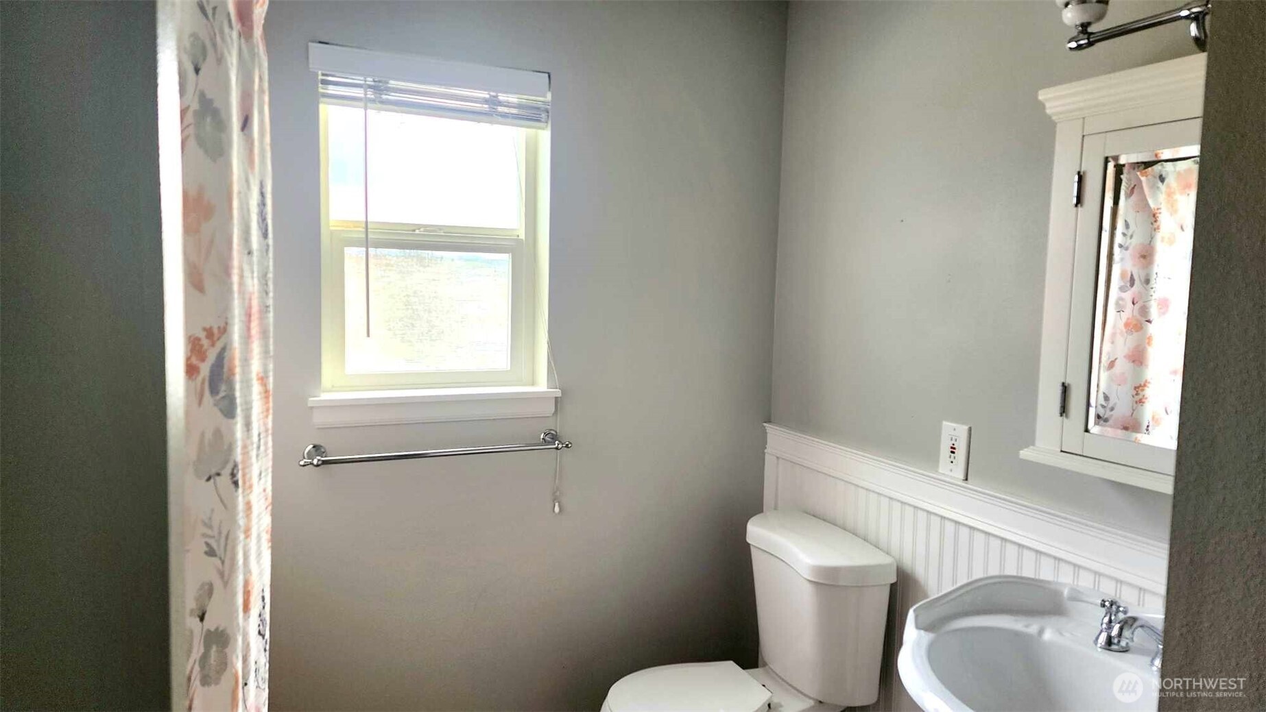 485 Southwest Bayshore Drive, Unit C301 Oak Harbor, WA 98277 - Photo 10 of 40 a white toilet sitting next to a bathroom sink