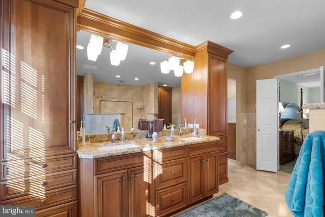 a bedroom with furniture and wooden floor