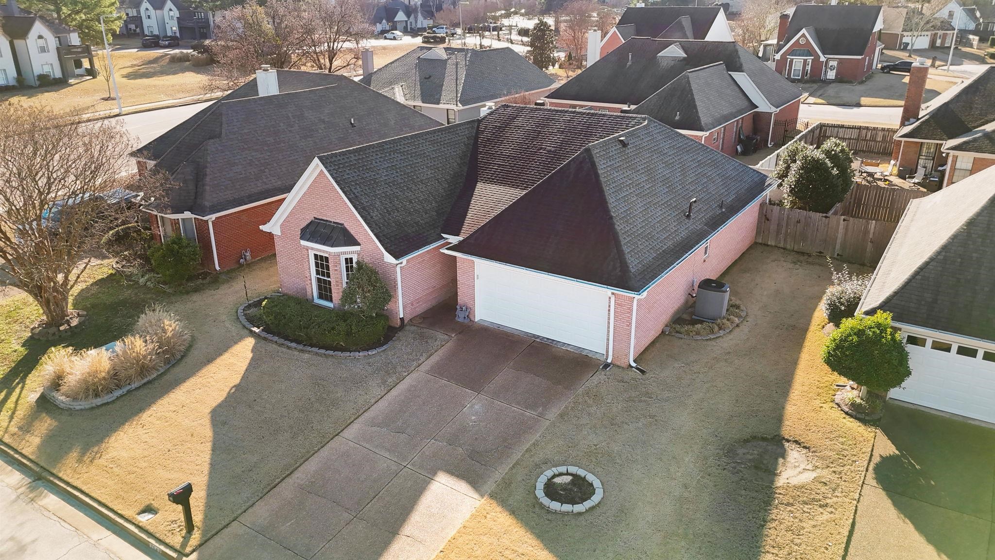 1147 Junco Cove Collierville, TN 38017 - Photo 14 of 30 an aerial view of a house with a yard