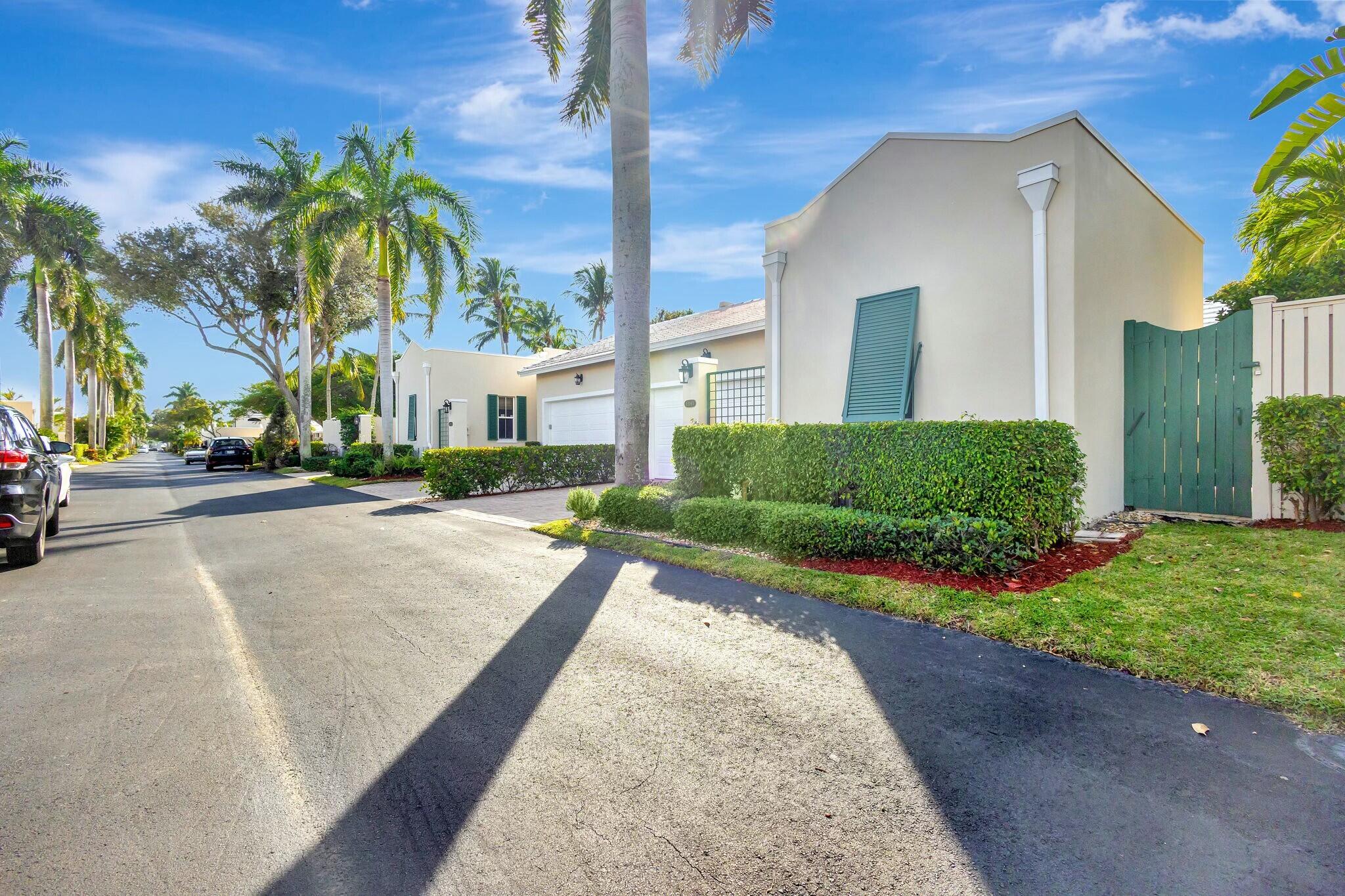 17161 Bermuda Village Drive Boca Raton, FL 33487 - Photo 3 of 54 a view of a street with a building in the background
