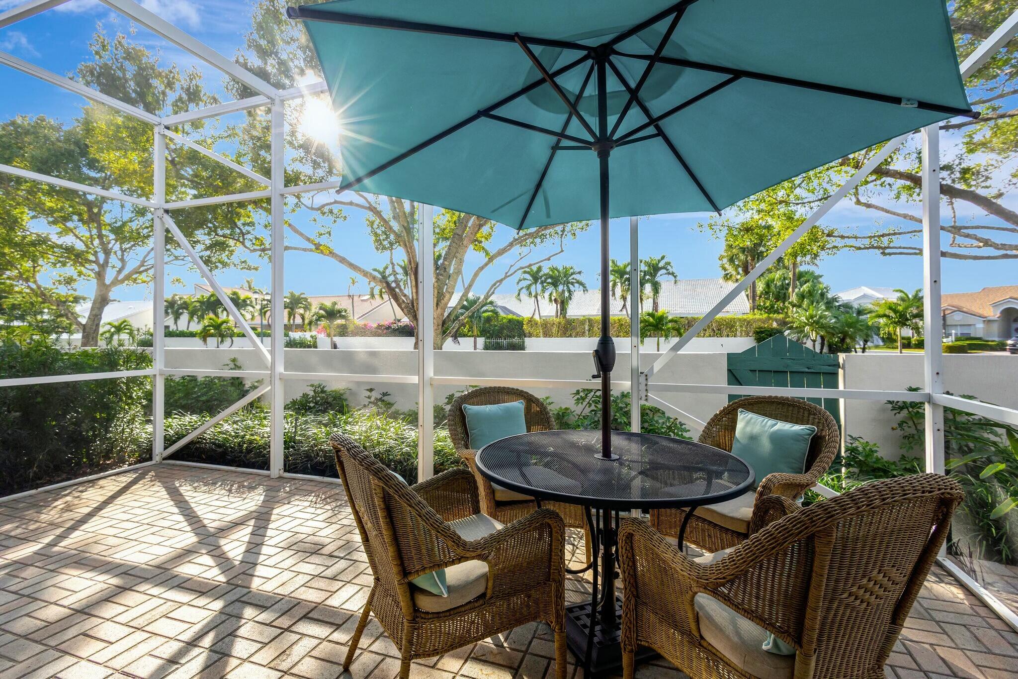 17161 Bermuda Village Drive Boca Raton, FL 33487 - Photo 41 of 54 a view of balcony with wooden floor and outdoor seating