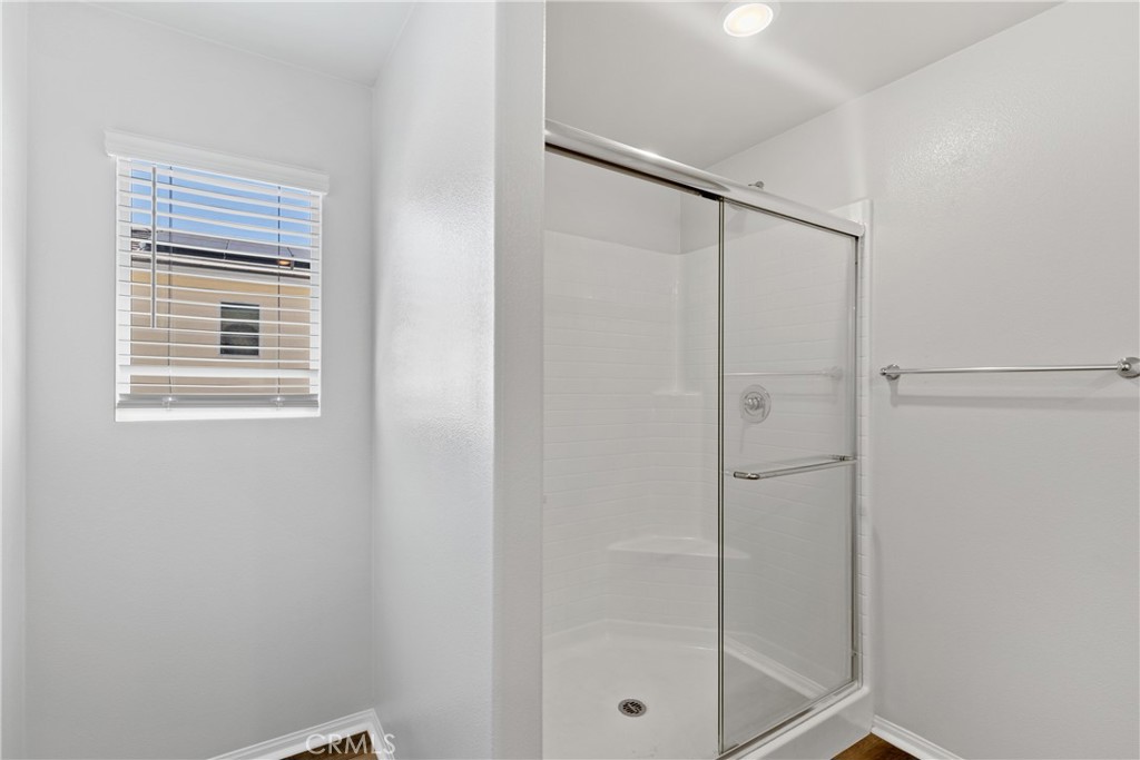 36390 West Flare Winchester, CA 92569 - Photo 12 of 46 a bathroom with a shower