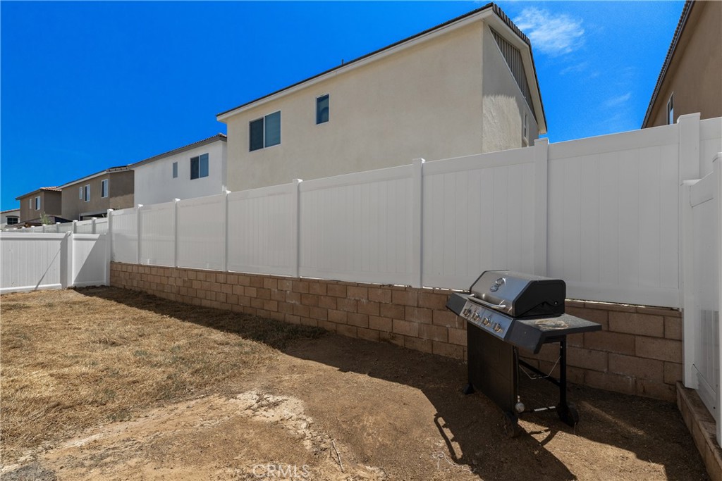 36390 West Flare Winchester, CA 92569 - Photo 23 of 46 a bedroom with a bed and a window