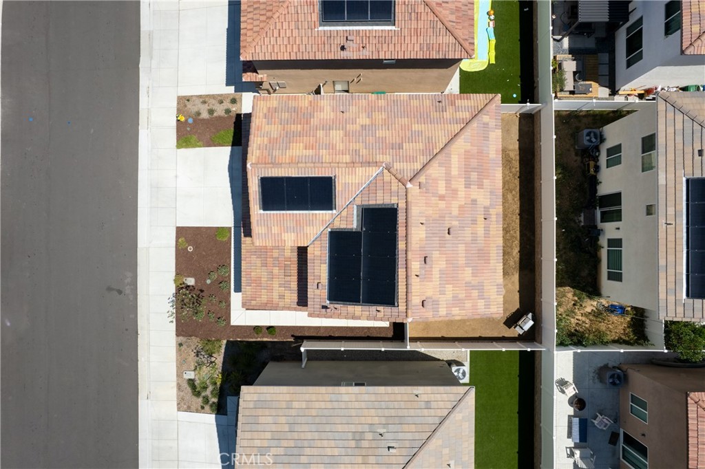 36390 West Flare Winchester, CA 92569 - Photo 25 of 46 a front view of a house with large windows