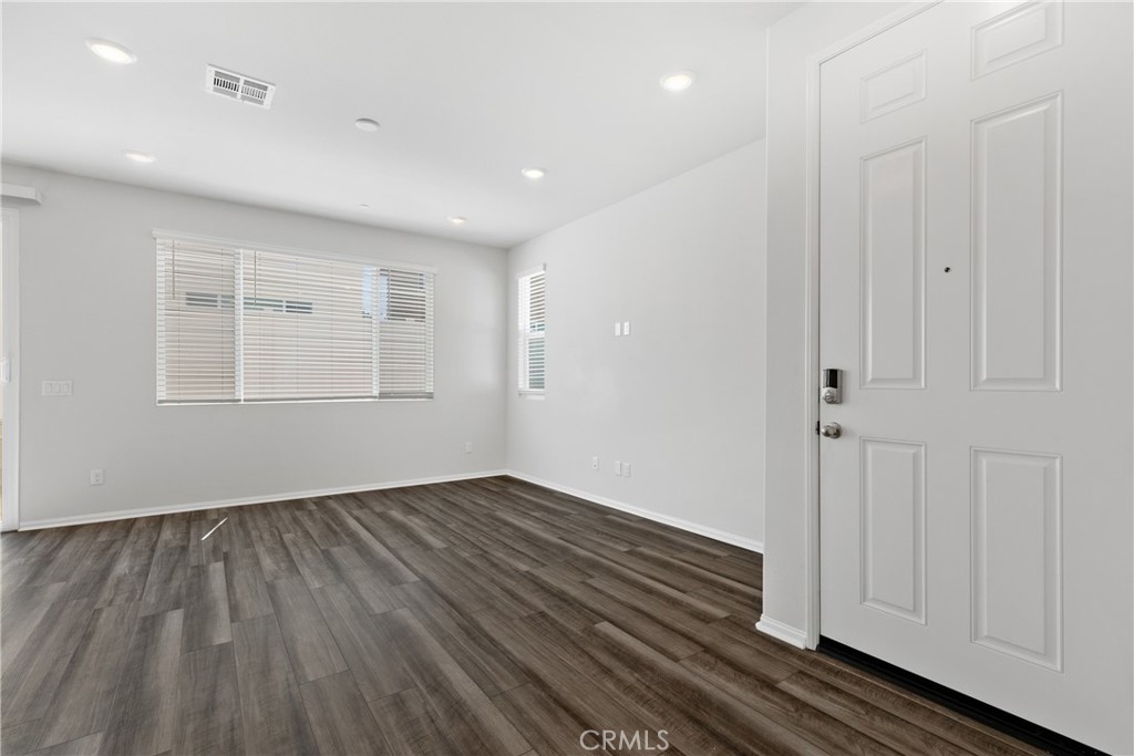 36390 West Flare Winchester, CA 92569 - Photo 31 of 46 wooden floor in an empty room with a window