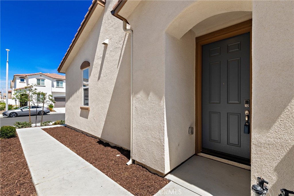 36390 West Flare Winchester, CA 92569 - Photo 4 of 46 a view of an entryway with staircase