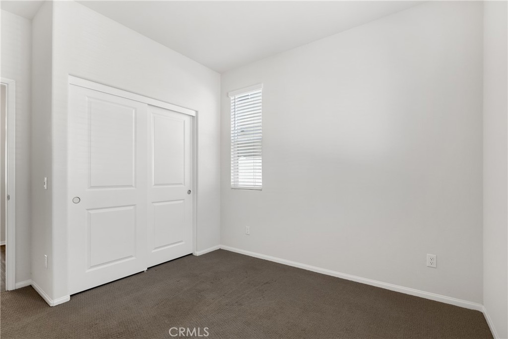 36390 West Flare Winchester, CA 92569 - Photo 5 of 46 an empty room with windows