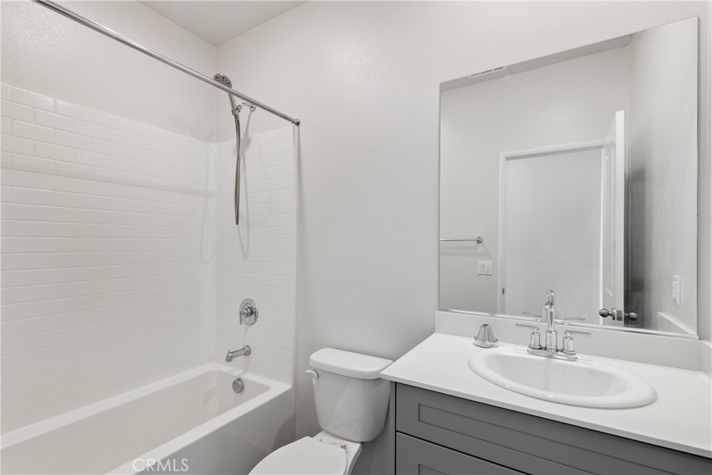 36390 West Flare Winchester, CA 92569 - Photo 6 of 46 a bathroom with a sink toilet and shower