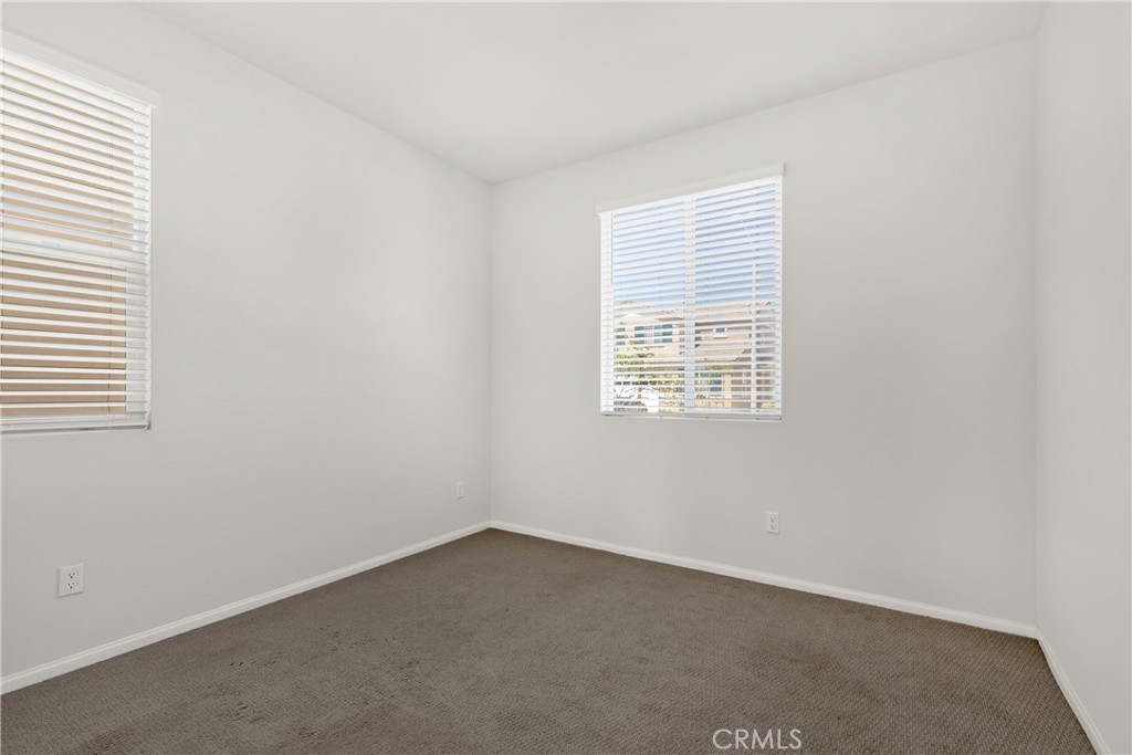 36390 West Flare Winchester, CA 92569 - Photo 9 of 46 an empty room with a window