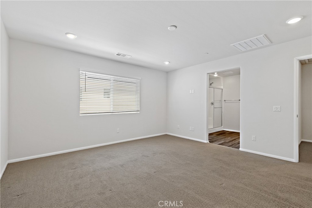 36390 West Flare Winchester, CA 92569 - Photo 10 of 46 an empty room with closet and windows