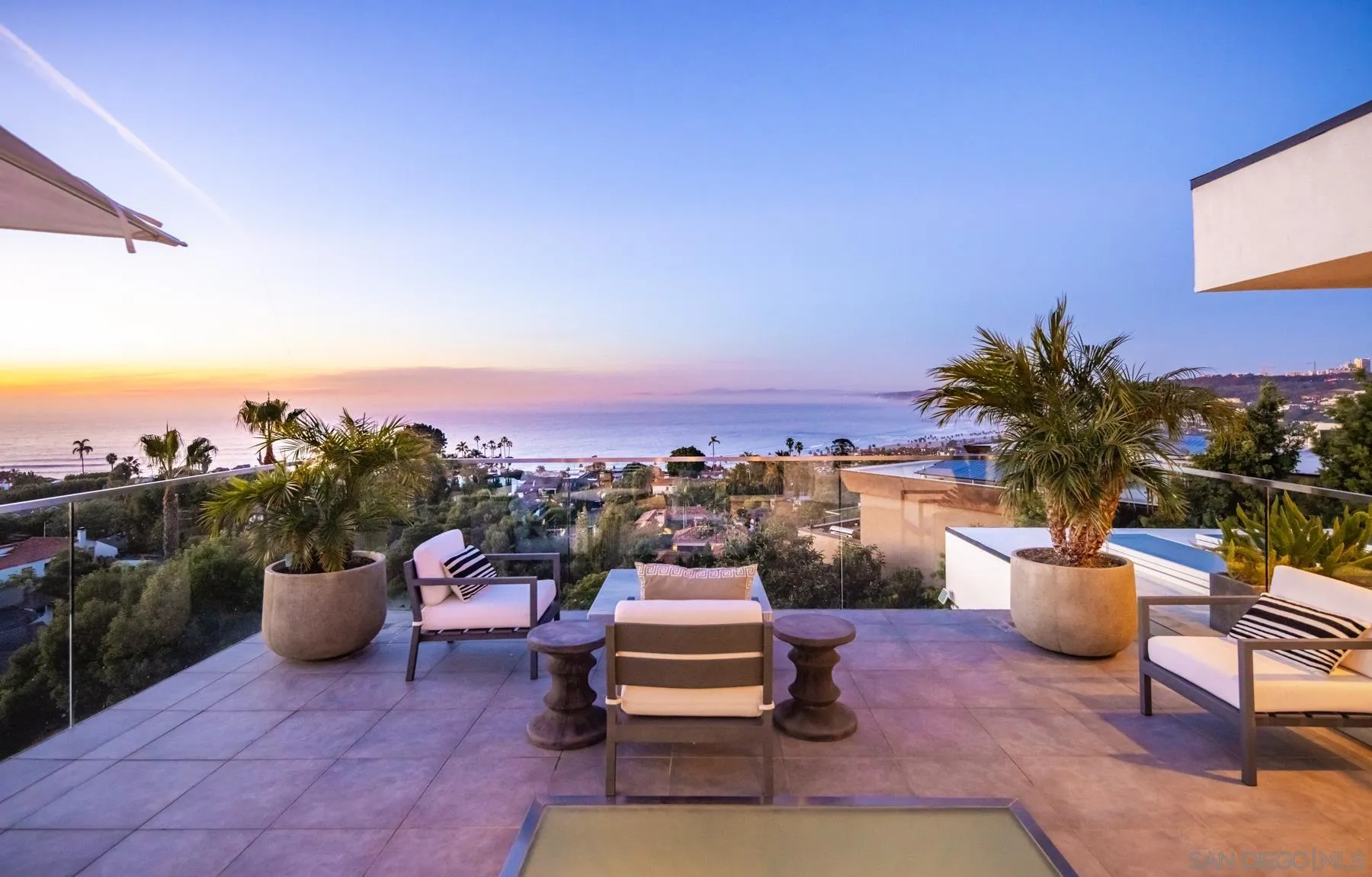 a view of a terrace with furniture