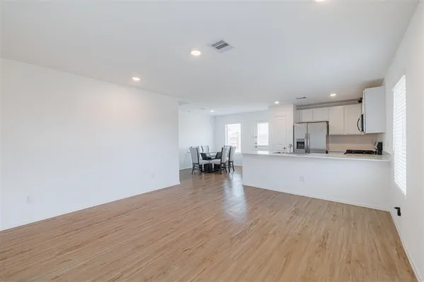 a view of kitchen with breakfast area