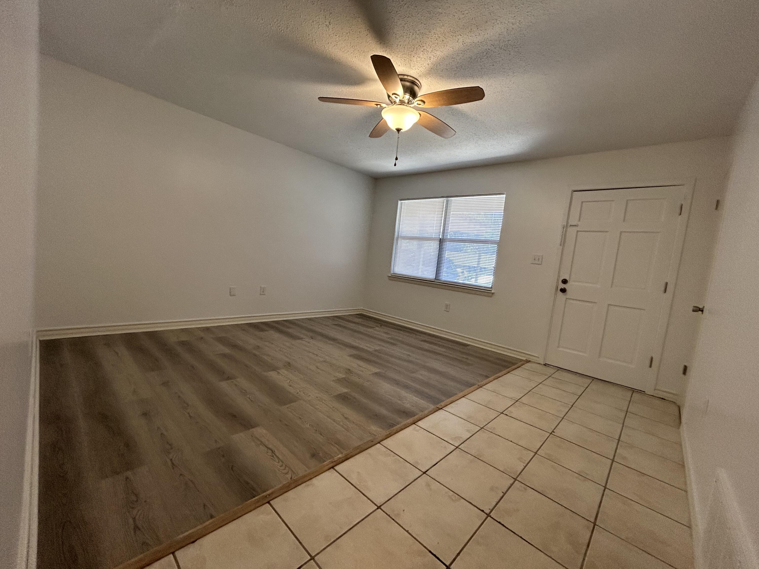 107 Lea Place Crestview, FL 32539 - Photo 8 of 18 107 lea kitch to liv front door