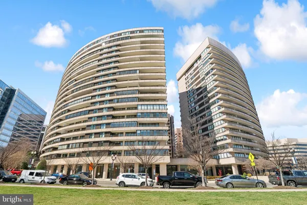 a front view of building with yard