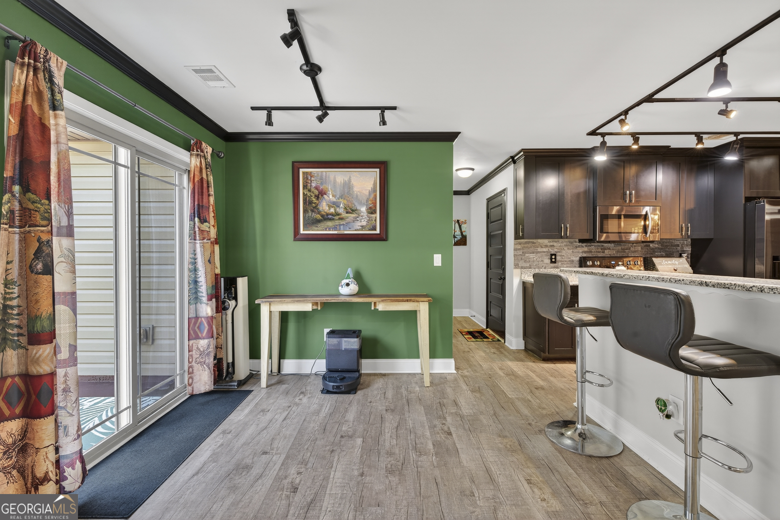 255 Needleleaf Drive Barnesville, GA 30204 - Photo 14 of 47 a view of kitchen with furniture and a fireplace