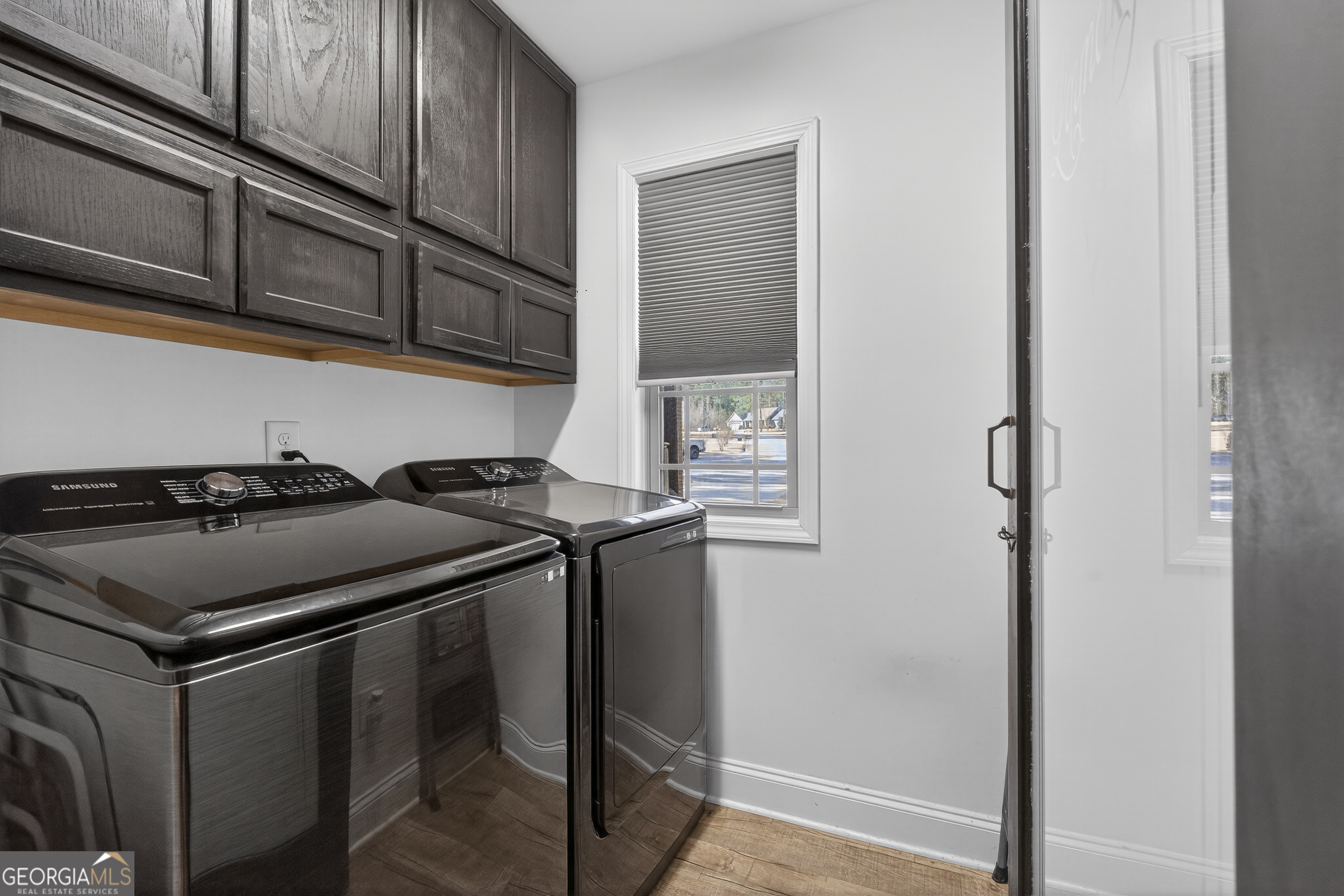255 Needleleaf Drive Barnesville, GA 30204 - Photo 19 of 47 a kitchen with stainless steel appliances granite countertop a stove and a refrigerator
