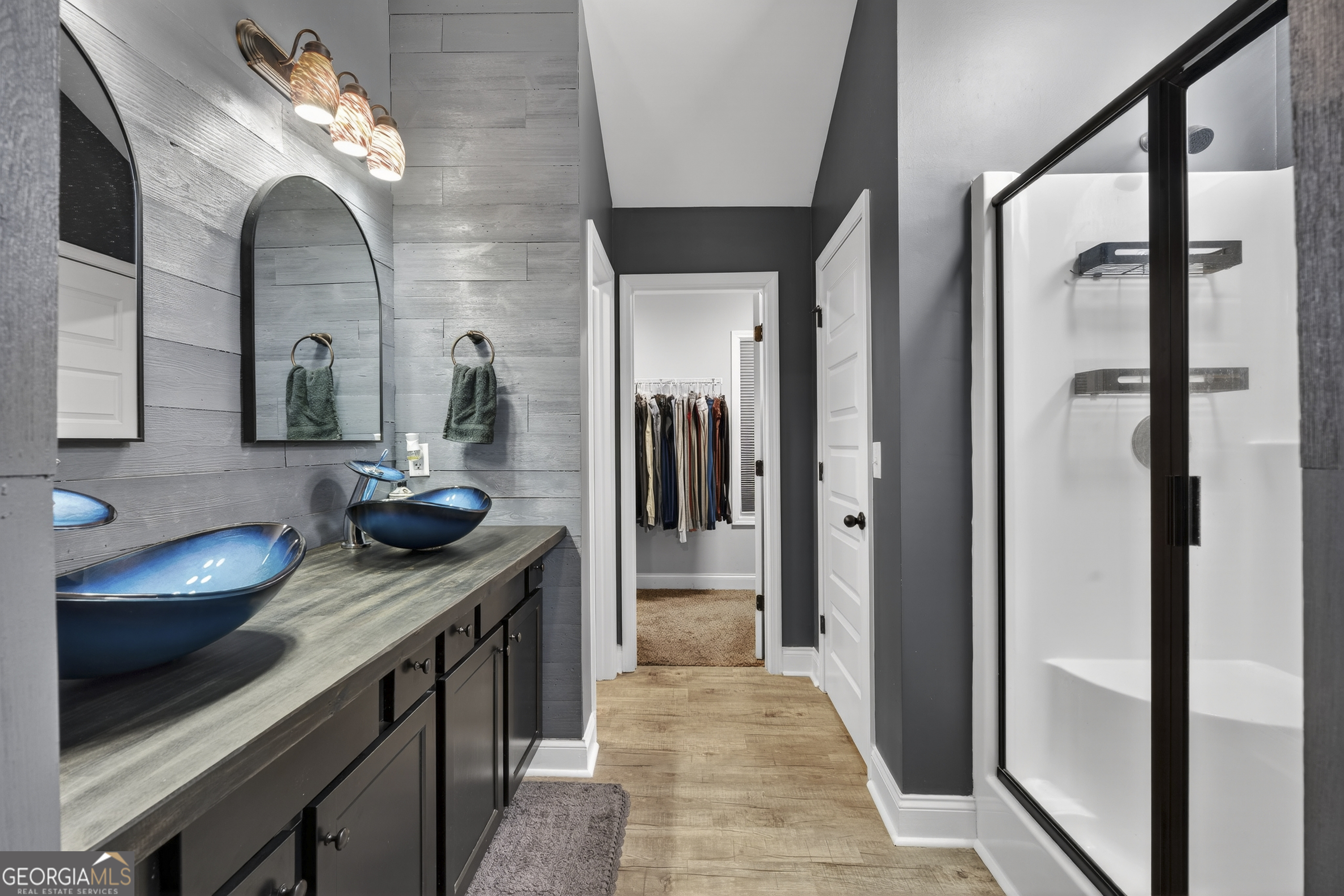 255 Needleleaf Drive Barnesville, GA 30204 - Photo 26 of 47 a bathroom with a sink and a mirror