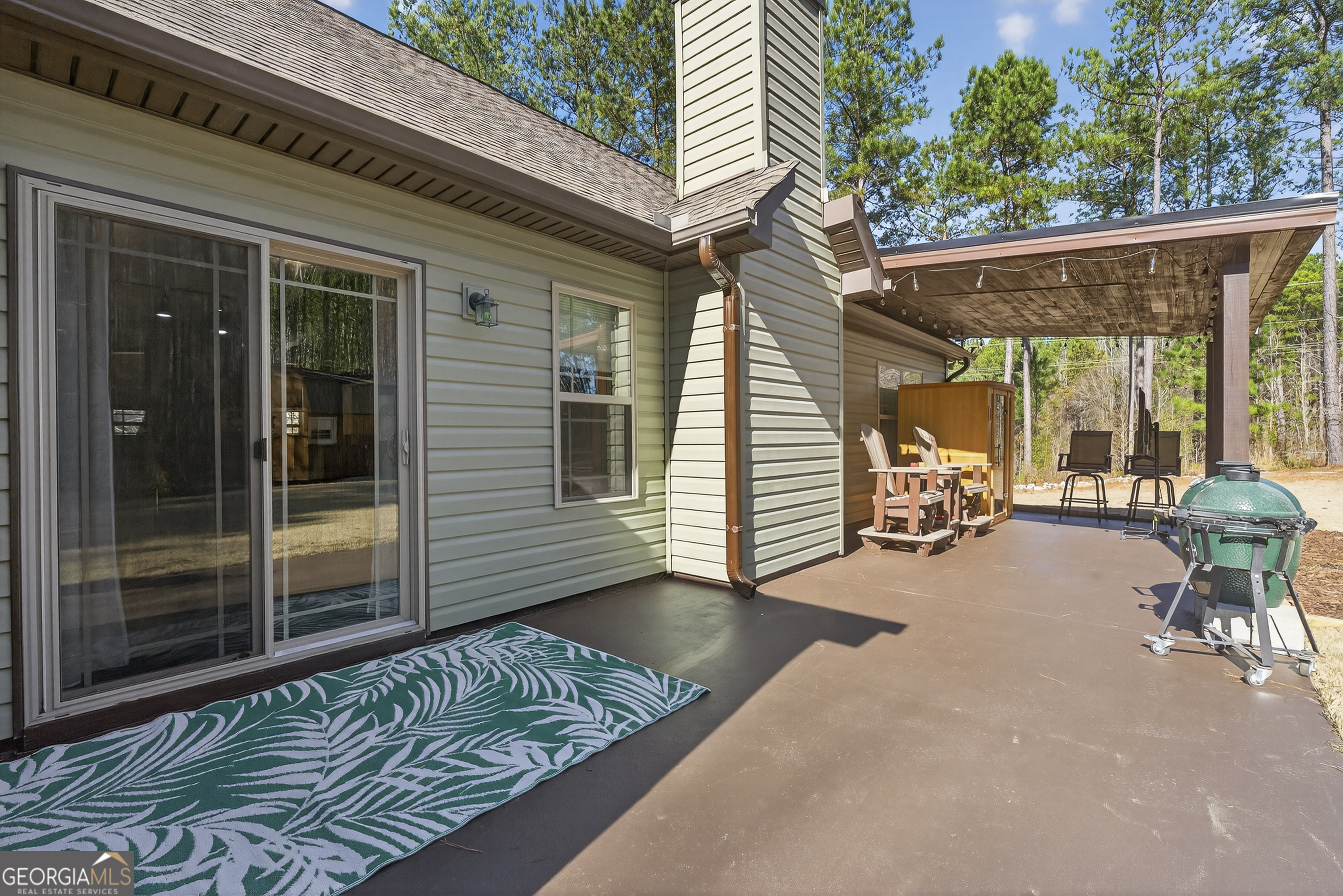 255 Needleleaf Drive Barnesville, GA 30204 - Photo 30 of 47 a view of a two chair in the balcony