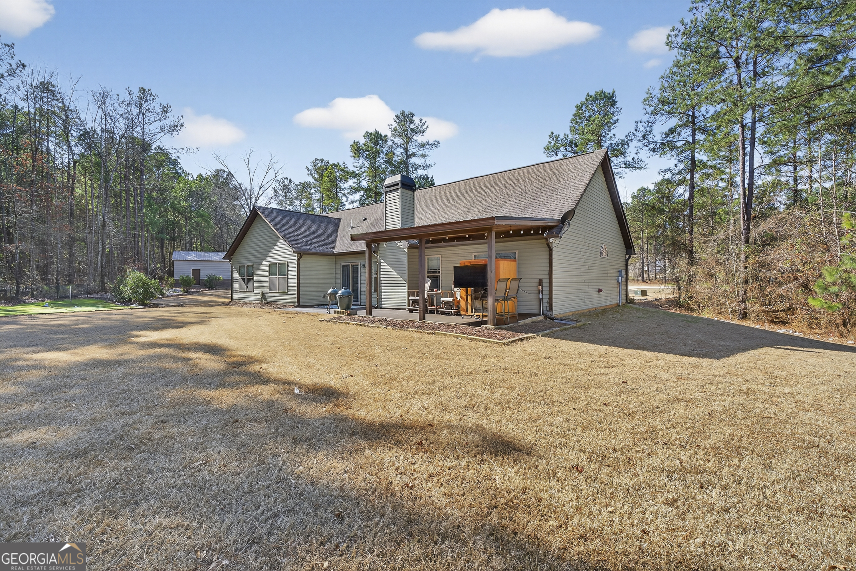 255 Needleleaf Drive Barnesville, GA 30204 - Photo 37 of 47 a view of a house with backyard and a tree