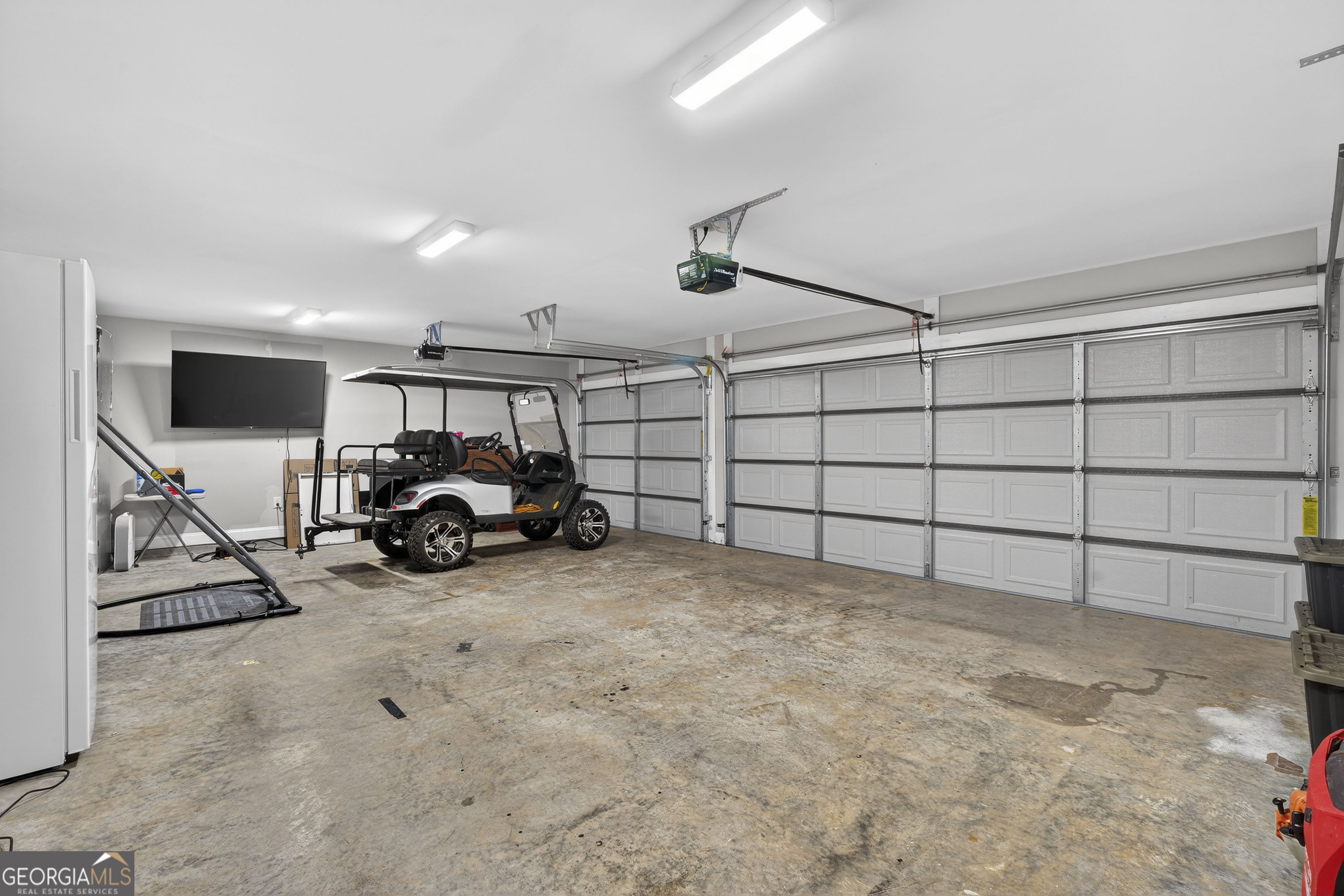 255 Needleleaf Drive Barnesville, GA 30204 - Photo 40 of 47 a view of a garage with cars