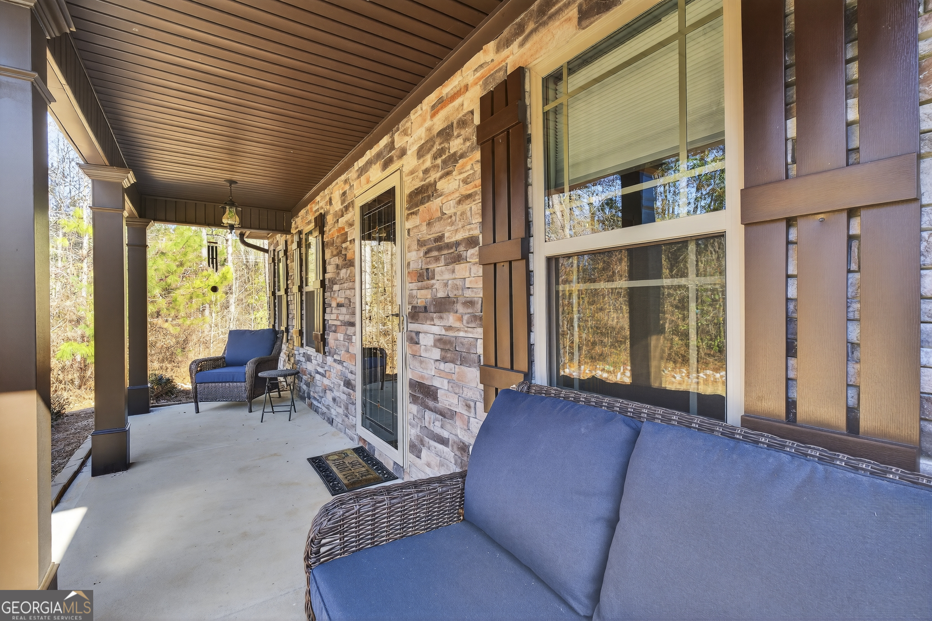 255 Needleleaf Drive Barnesville, GA 30204 - Photo 5 of 47 a living room with furniture and large windows