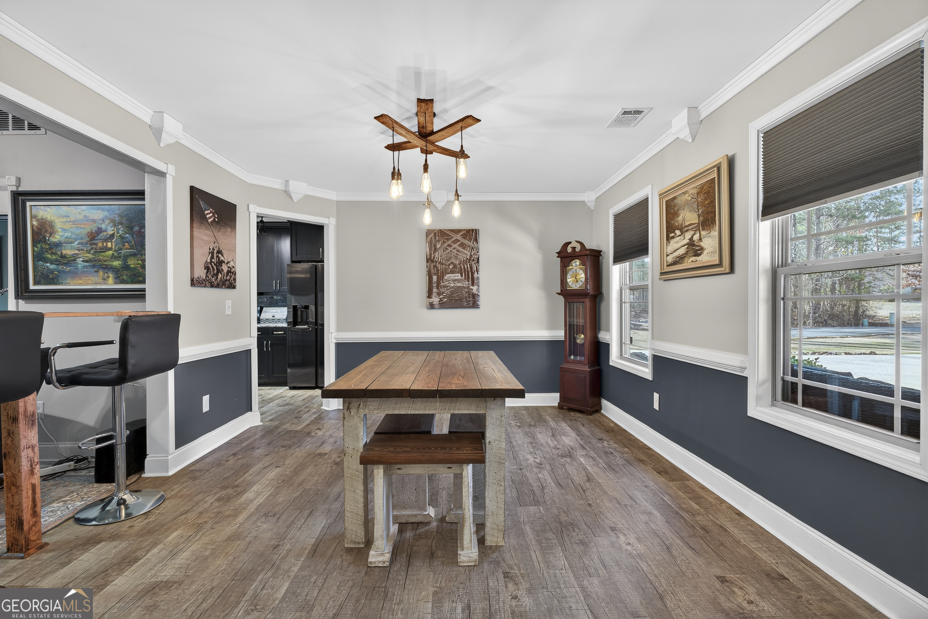 255 Needleleaf Drive Barnesville, GA 30204 - Photo 8 of 47 a living room with furniture and a wooden floor