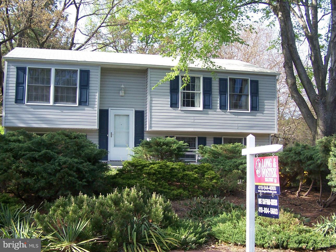 838 Evergreen Road Severn, MD 21144 - Photo 1 of 2 a front view of a house with plants
